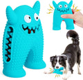 Brighty MonsterChew – Blue monster-shaped squeaky dog chew toy with treat cavity, shown being squeezed and played with by a Border Collie