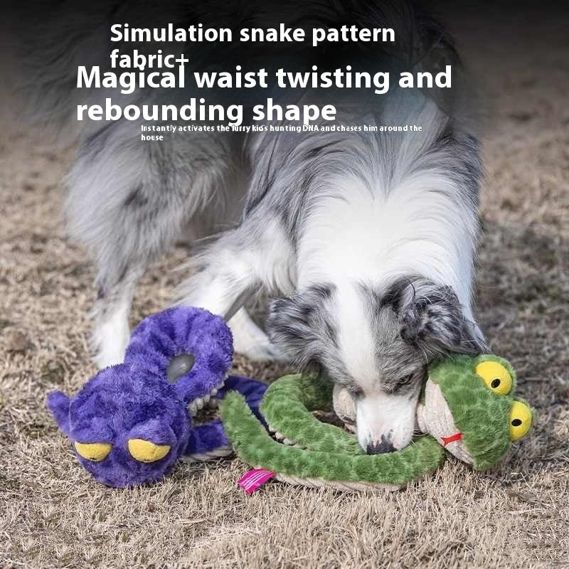 Dog playing with Brighty Boa XL squeaky snake toys in green and purple – interactive dog toy
