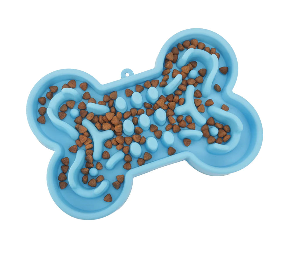 Brighty Slow Bowl in blue filled with kibble - top view of bone-shaped puzzle feeder
