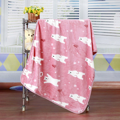 Brighty BearHug soft fleece blanket in pink with polar bear and snowflake print, hanging display