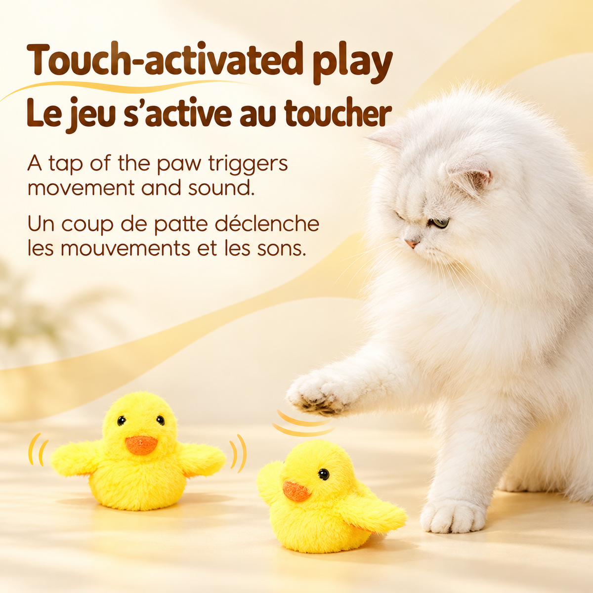 White cat reaching towards a yellow Brighty FlappyDuck, with motion marks illustrating how a paw tap activates wing movement and sound.