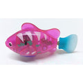Soft pink Brighty GlowFish swimming fish cat toy with white and green markings and a blue tail