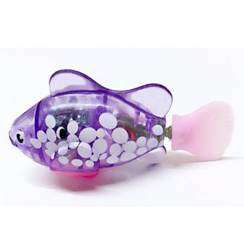 Purple Brighty GlowFish electronic swimming fish cat toy with white spots and a pink tail, shown on a white background.