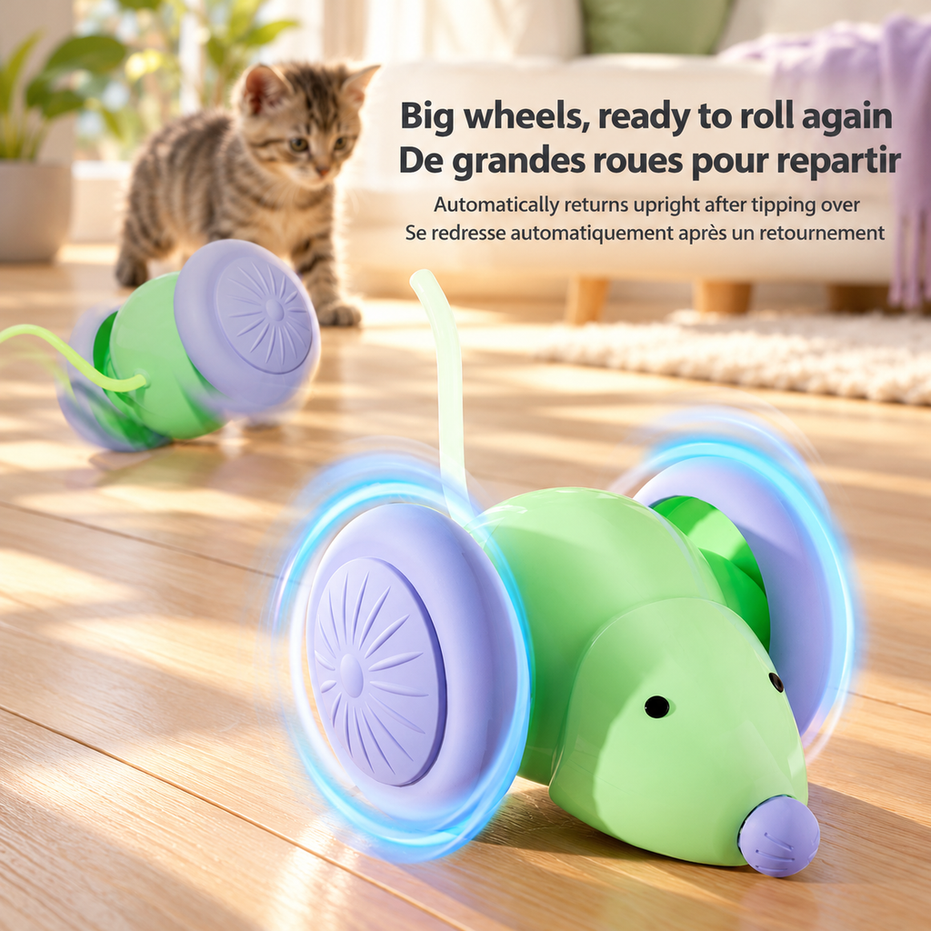 Green Brighty MouseDash with large purple wheels, shown upright and tipped on its side near a kitten to illustrate its automatic self-righting feature.