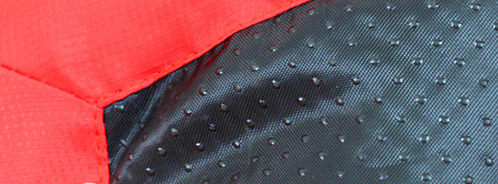 Close-up of the waterproof Oxford fabric texture on the Brighty TravelRest dog travel mat