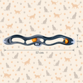 Grey Brighty WindowTrack with orange balls and suction cup mounts, showing dimensions of 57 cm long by 10 cm wide against a cat-patterned background.