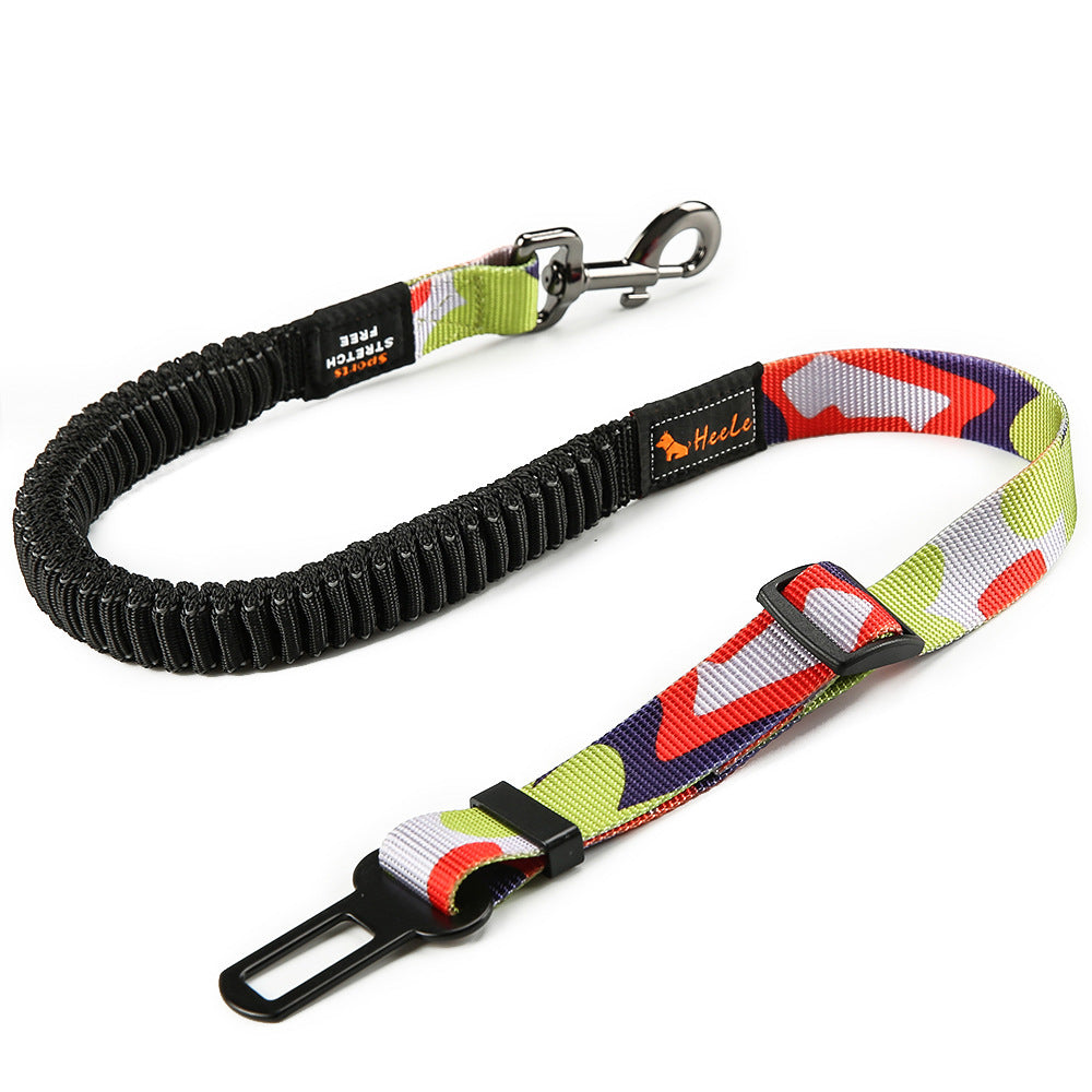Green, red, violet and white HEELE RoadFlex dog car tether with an elastic section, swivel clip, adjustable strap and seat belt tab.