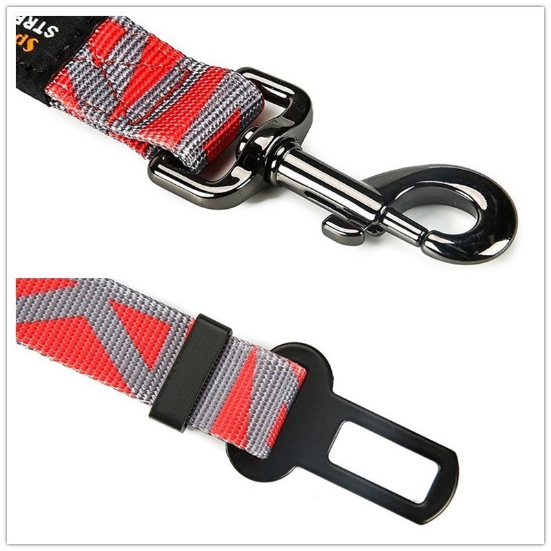 Close-up of the red and grey HEELE RoadFlex tether showing its swivel clip and seat belt tab.