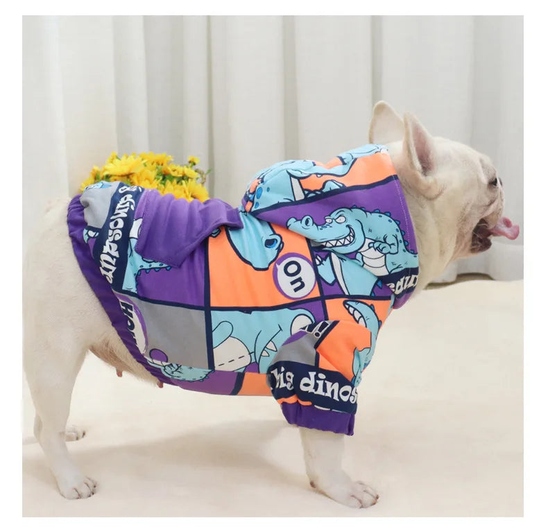 French Bulldog wearing Brighty DinoWarm purple dinosaur hoodie for dogs during outdoor walk