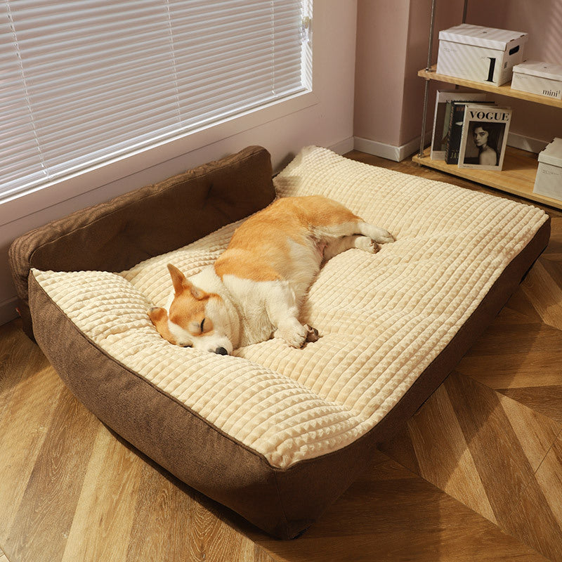 Corgi resting on Brighty CozyHaven sofa dog bed with soft padded edges, caramel color