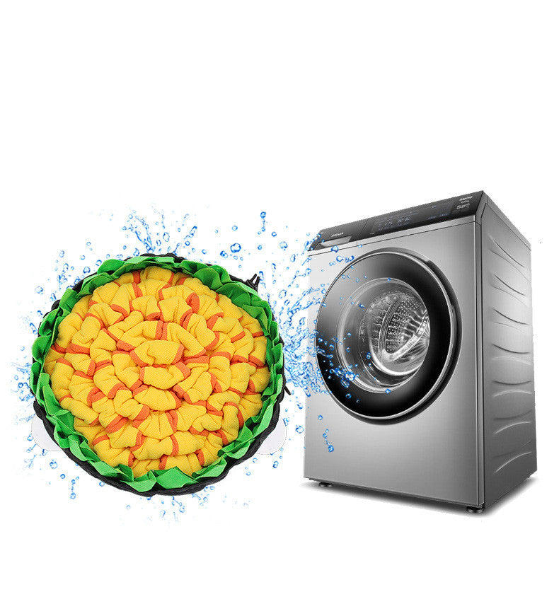 Brighty SnuffleFlower washable dog snuffle mat shown beside a washing machine for easy care.