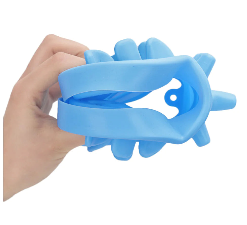 Brighty Slow Bowl in blue showing flexible silicone material and bone cutout design