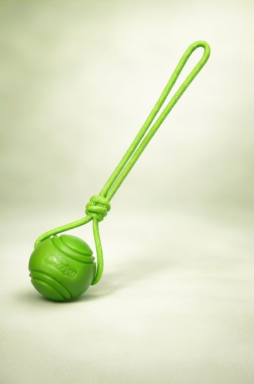 Brighty ToughBall green durable rubber dog ball with rope for outdoor fetch and dental stimulation